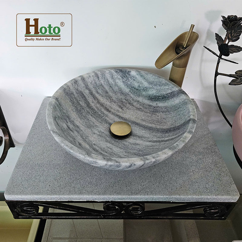 Bàn đá lavabo treo tường gọn gàng, thẩm mỹ cho nhà vệ sinh theo phòng cách tân cổ điển.
