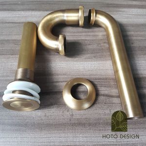 Bộ xả lavabo bằng đồng nắp nhỏ kiểu cổ điển.