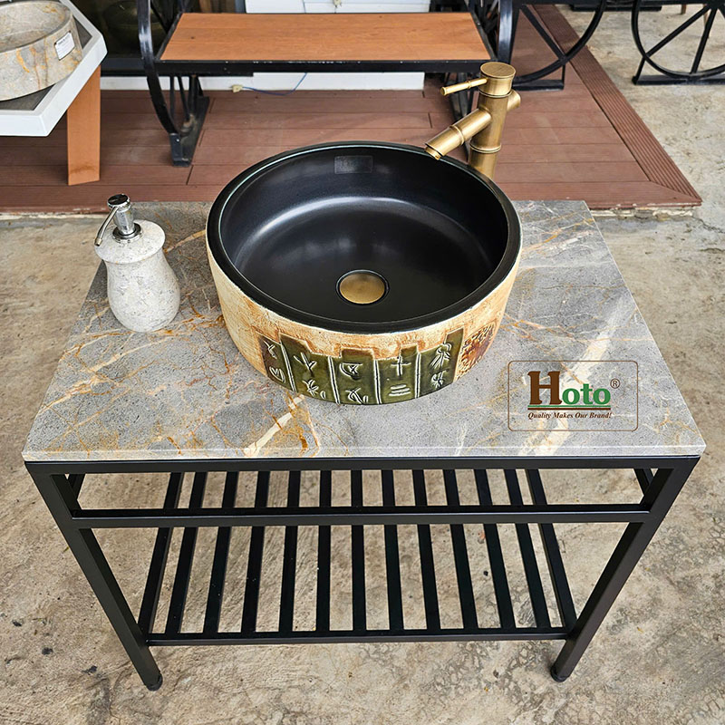 Bàn đá đặt chậu lavabo gốm kiểu dáng hiện đại sang trọng dành cho nhà tắm.