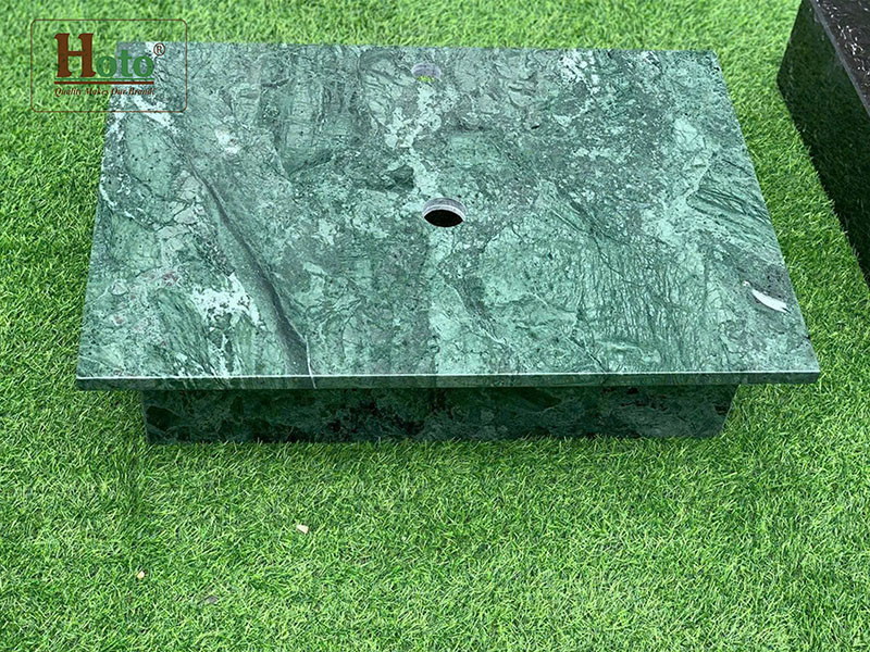 Bàn đá lavabo làm bằng đá marble cao cấp, treo tường gọn gàng, sang trọng màu xanh rêu.