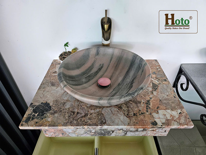 Bàn đá lavabo làm bằng đá marble cao cấp, treo tường gọn gàng, sang trọng màu hồng.
