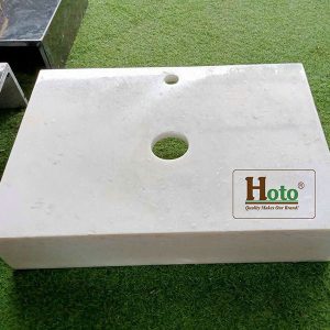 Bàn đá lavabo làm bằng đá marble cao cấp, treo tường gọn gàng, sang trọng màu trắng.