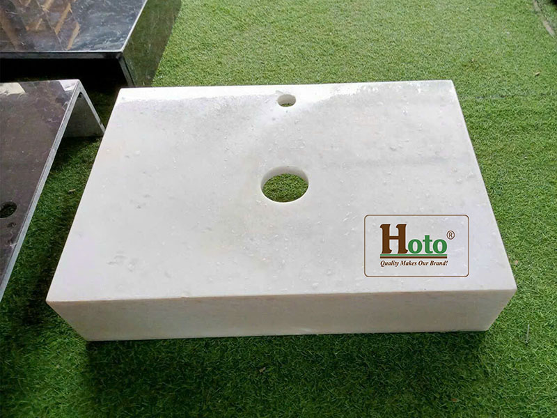 Bàn đá lavabo làm bằng đá marble cao cấp, treo tường gọn gàng, sang trọng màu trắng.