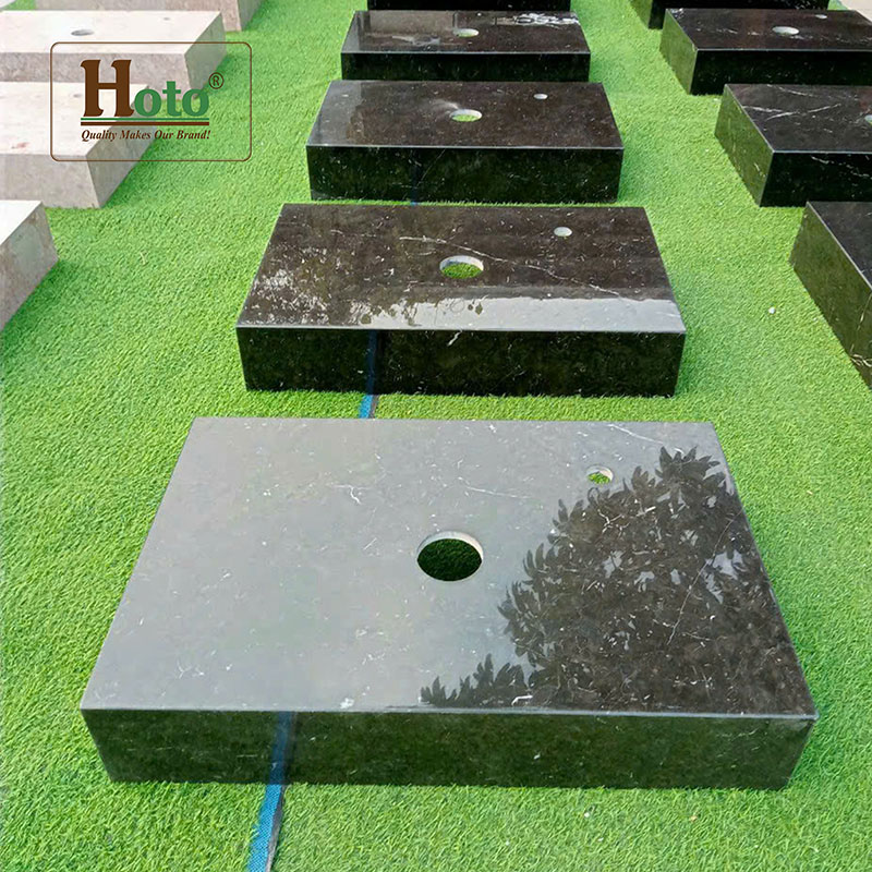 Bàn đá lavabo làm bằng đá marble cao cấp, treo tường gọn gàng, sang trọng màu đen.